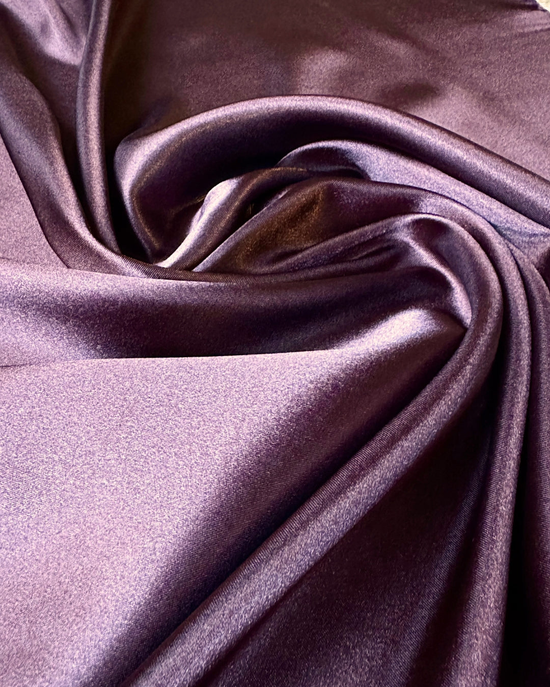 Close-up of brown scarf fabric with folds