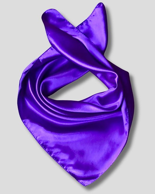 Purple satin scarf on a light gray background