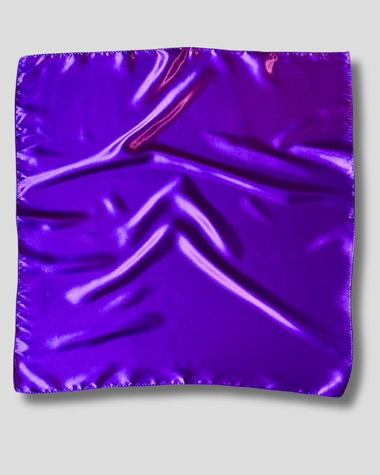Shiny purple square scarf on a light gray background