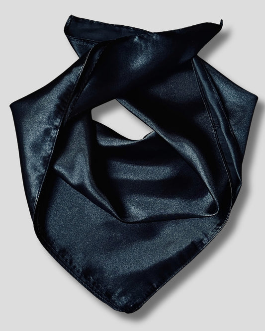 Black satin scarf on a light gray background