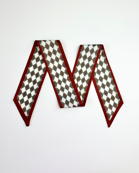 Checkered pattern and red border scarf on a white background
