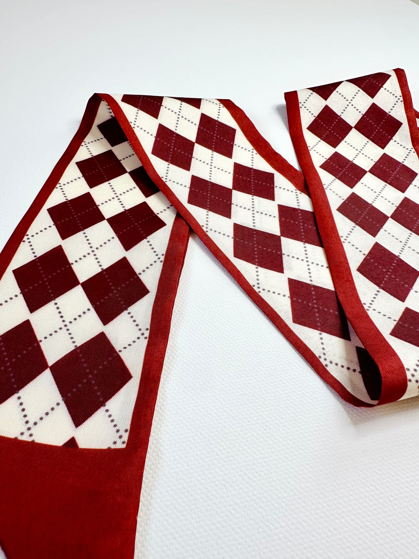 ribbon scarf red and white checkered on a white background